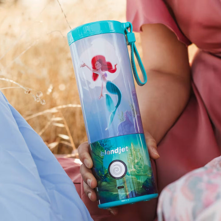 BlendJet 2 Disney The Little Mermaid Ariel Cordless Personal Blender - Blender Held in Hand In Field