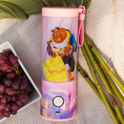 BlendJet 2 Disney Beauty and the Beast Belle Cordless Personal Blender - Blender on Picnic Blanket with Asparagus and Grapes