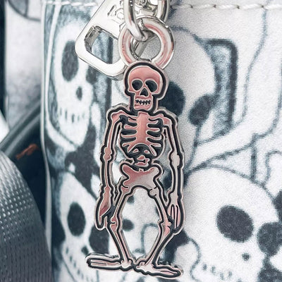 Close-up of the zipper pull of the Loungefly Disney Mickey Mouse Haunted House Mini Backpack, featuring a detailed skeleton charm.