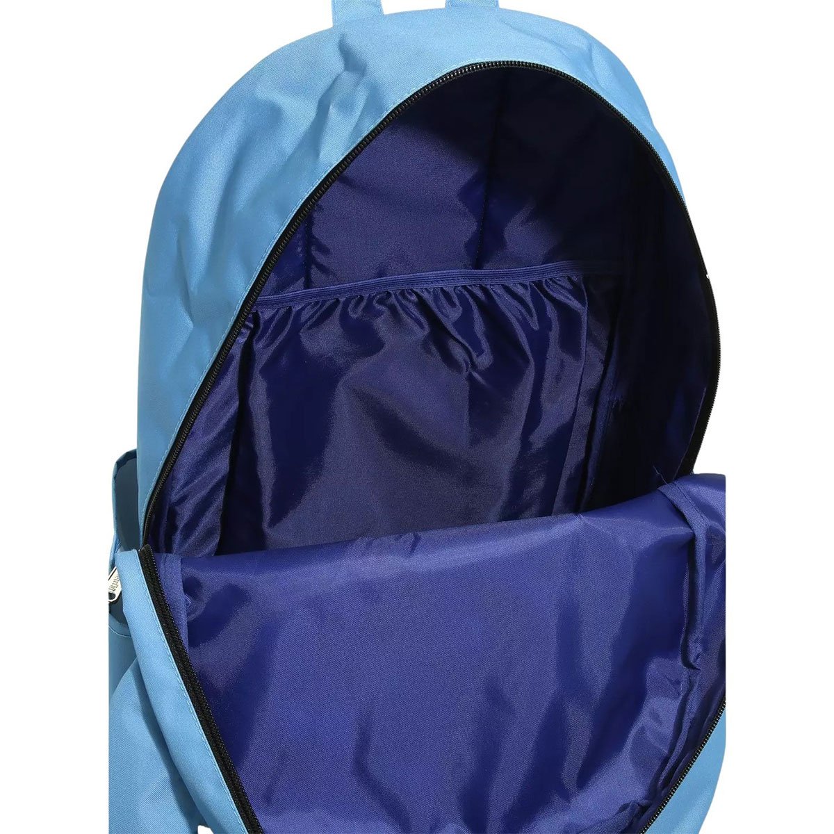 Inside view of a blue nylon backpack with a dark blue interior lining and an elastic pocket.