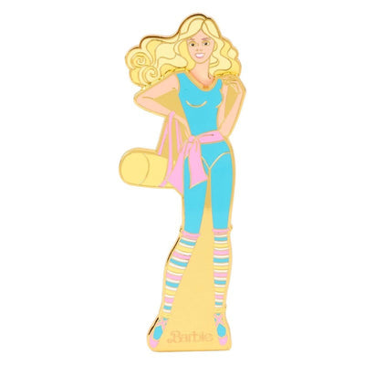 Magnetic pin of Barbie in a teal and pink yoga outfit, holding a yoga mat, and sporting leg warmers, representing the 65th anniversary.