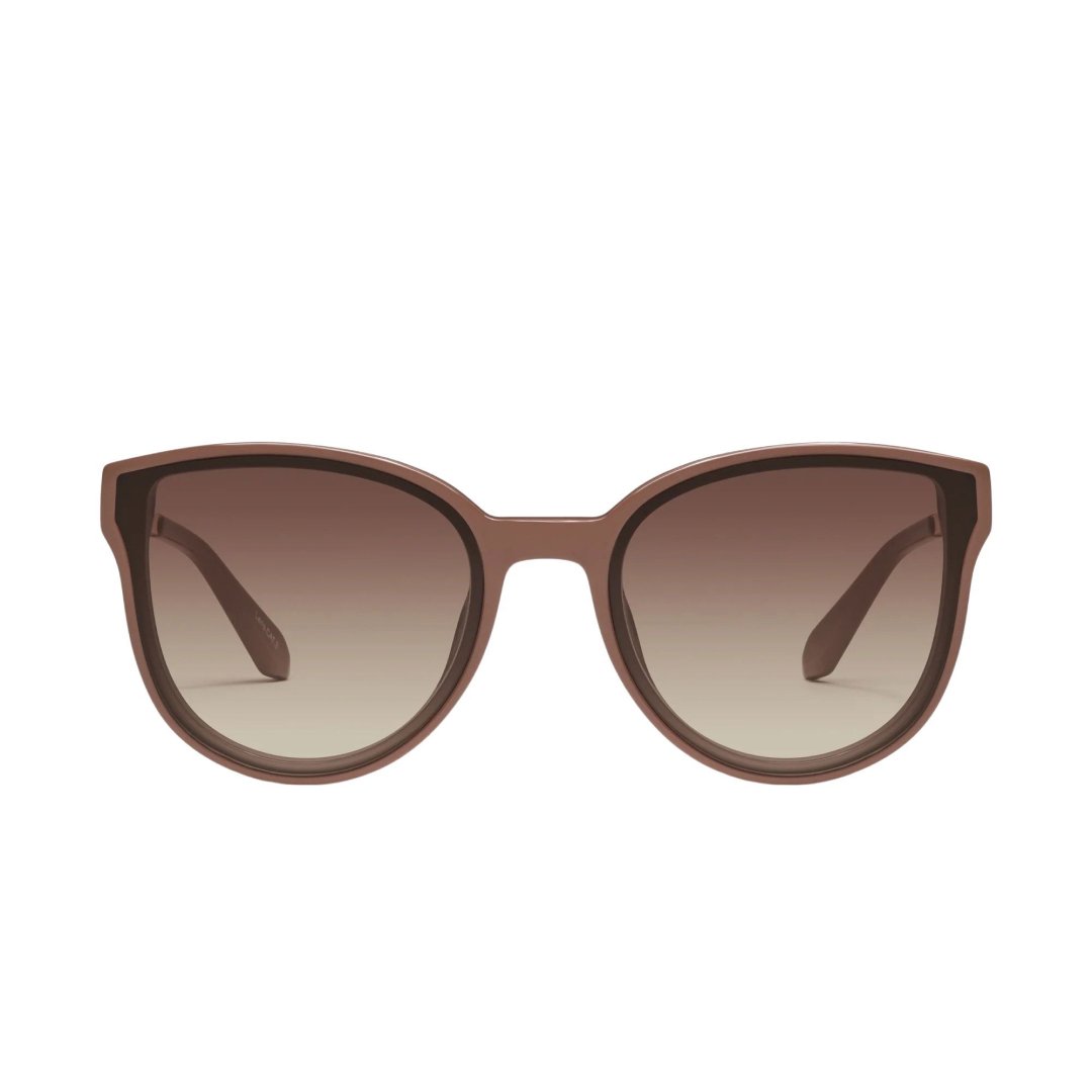Model wearing Quay Women's Date Night Oversized Round Sunglasses (Doe Frame/Brown Lens) - front