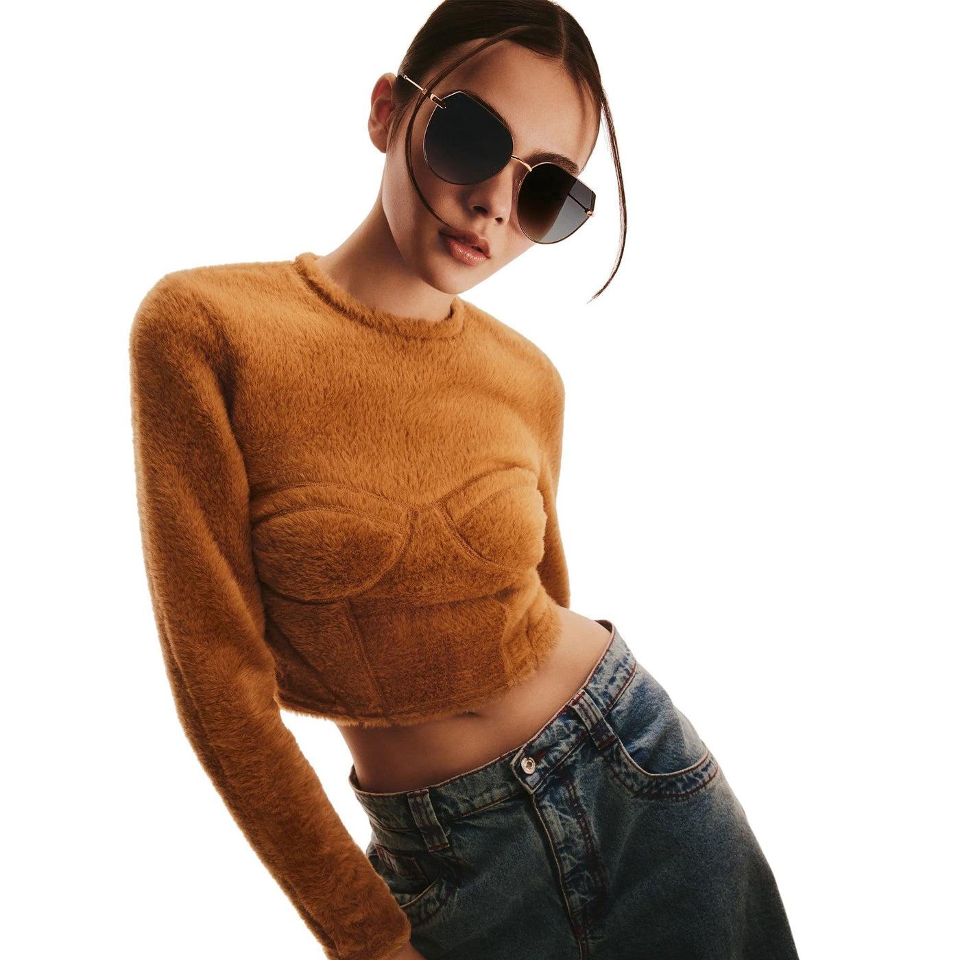 A model posing wearing Quay Women's Main Character Oversized Flat-Top Rounded Sunglasses