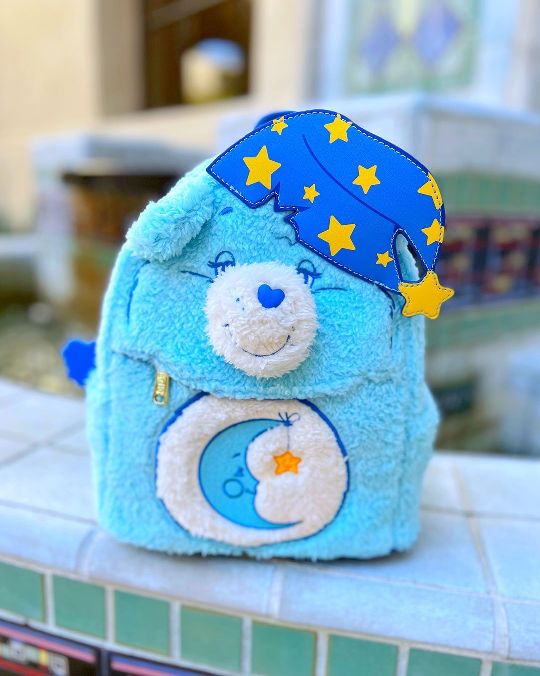 care bear mini backpack Loungefly: Bears which is decorated with a flocked version of his belly badge Care Bears Bedtime Bear US
