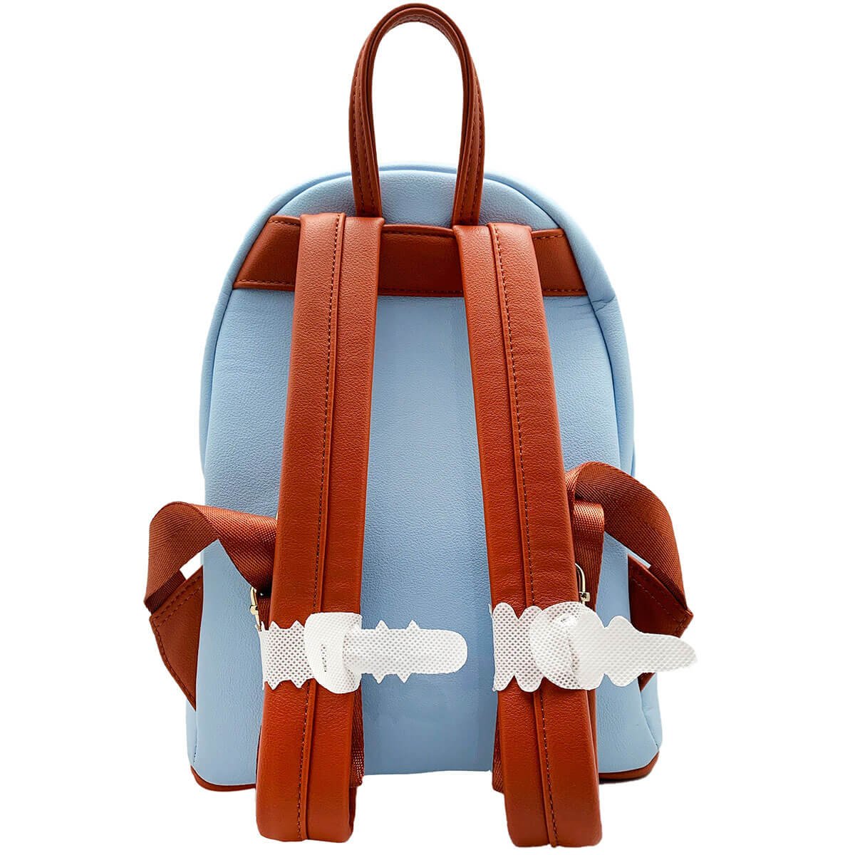 A view of the back of the Loungefly Disney Dumbo mini backpack, showcasing the light blue exterior and brown adjustable shoulder straps.