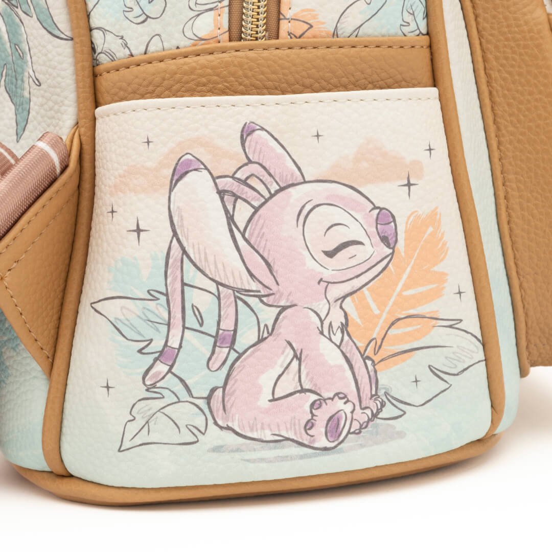 Close-up view of Angel, Stitch's friend, on the front pocket of the backpack. She appears playful and joyful, surrounded by light pastel illustrations of leaves and clouds.