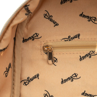 A close-up of the interior lining of the backpack showing a beige fabric with the Disney logo repeatedly printed in a dark tone. The image focuses on the quality of the stitching and the zipper closure.