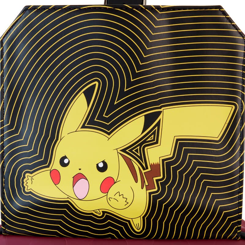 Interior flap of Loungefly COLLECTIV Pokemon ARTST Convertible Bag featuring a vibrant Pikachu design.