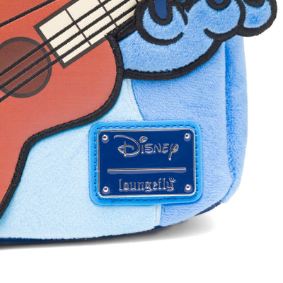 Close-up of the Loungefly Disney logo and detailing on the front of the mini backpack.