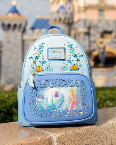 Loungefly Disney Princess Dreams Series Cinderella Mini Backpack - 707 Street Exclusive - Cinderella Loungefly Backpack in Front of Disneyland Castle Showing Front of Bag