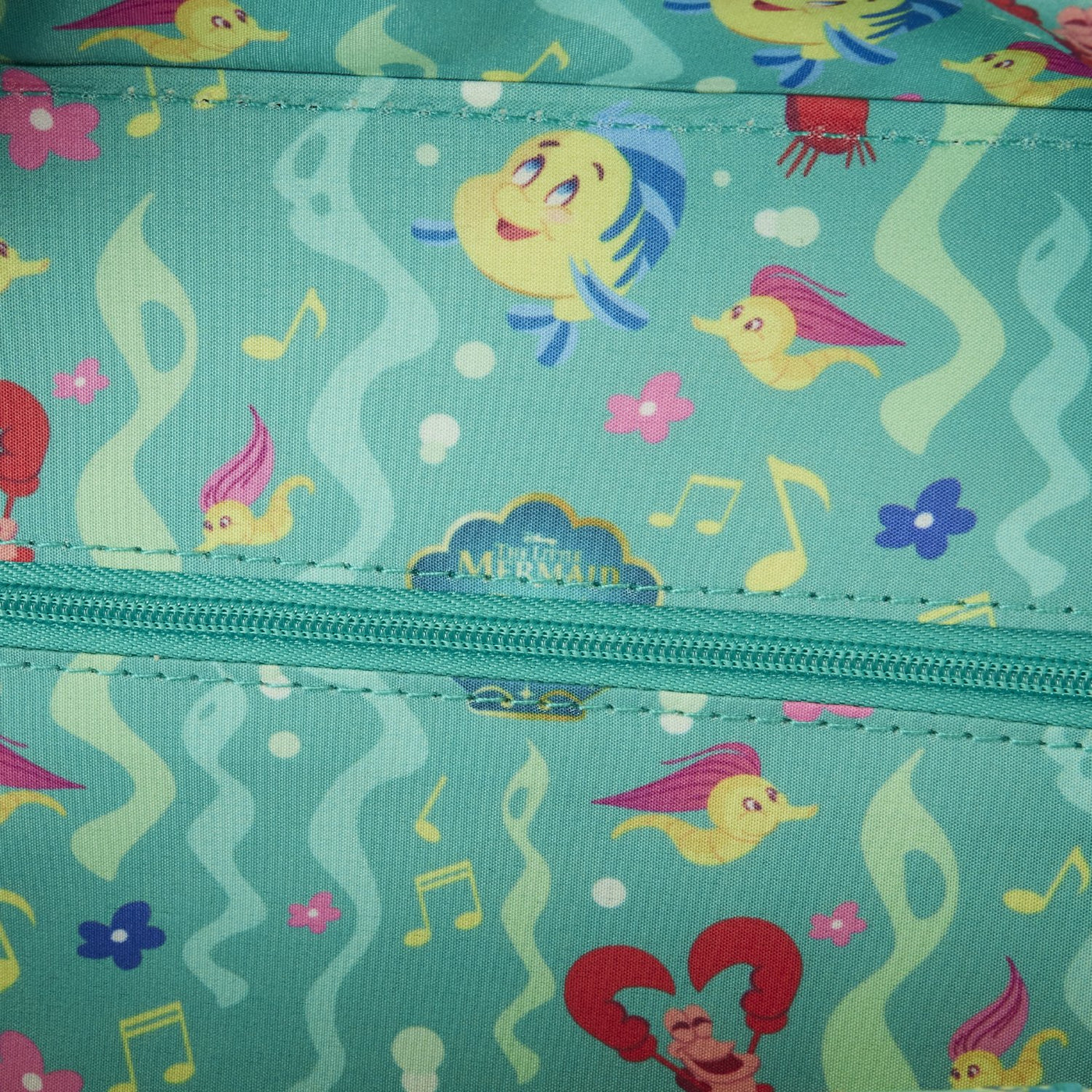 Loungefly Disney The Little Mermaid 35th Anniversary Ariel Face Crossbody - Interior Lining